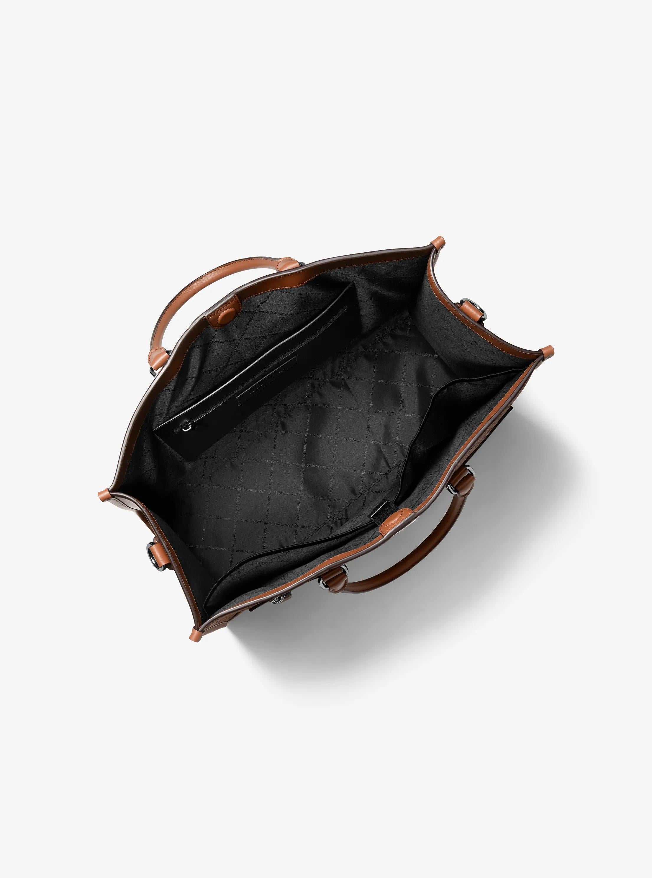 Jet Set Logo Embossed Leather Tote Bag