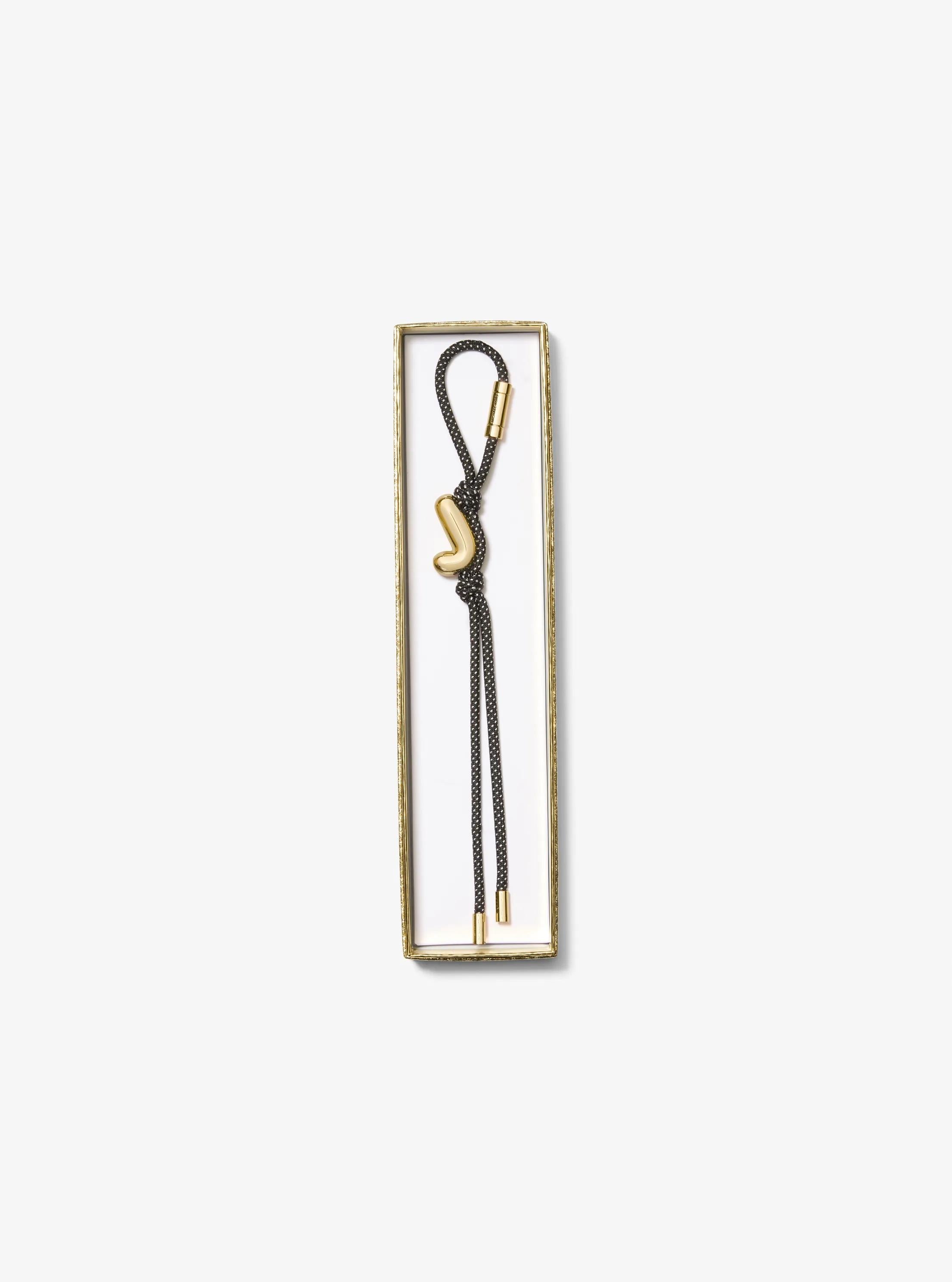 Initial Gold-Tone and Speckled Cord Bag Charm