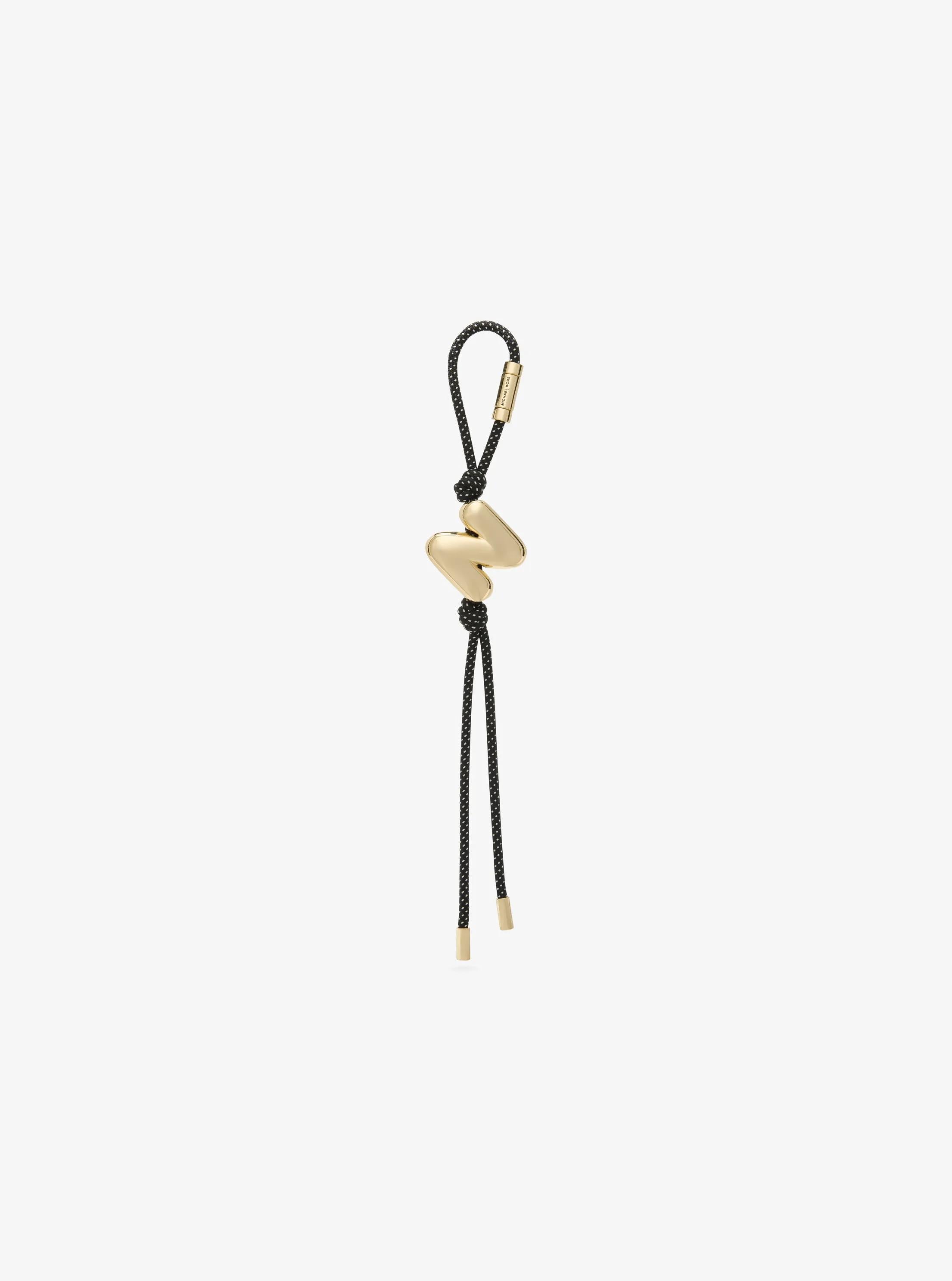Initial Gold-Tone and Speckled Cord Bag Charm